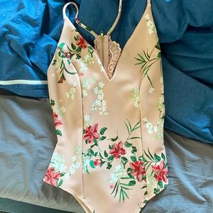 Windsor body suit. Pink floral. Size small